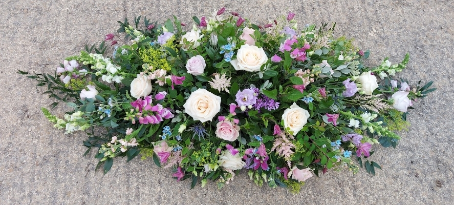 Mixed Casket Spray   Pinks, Blues and Lilacs